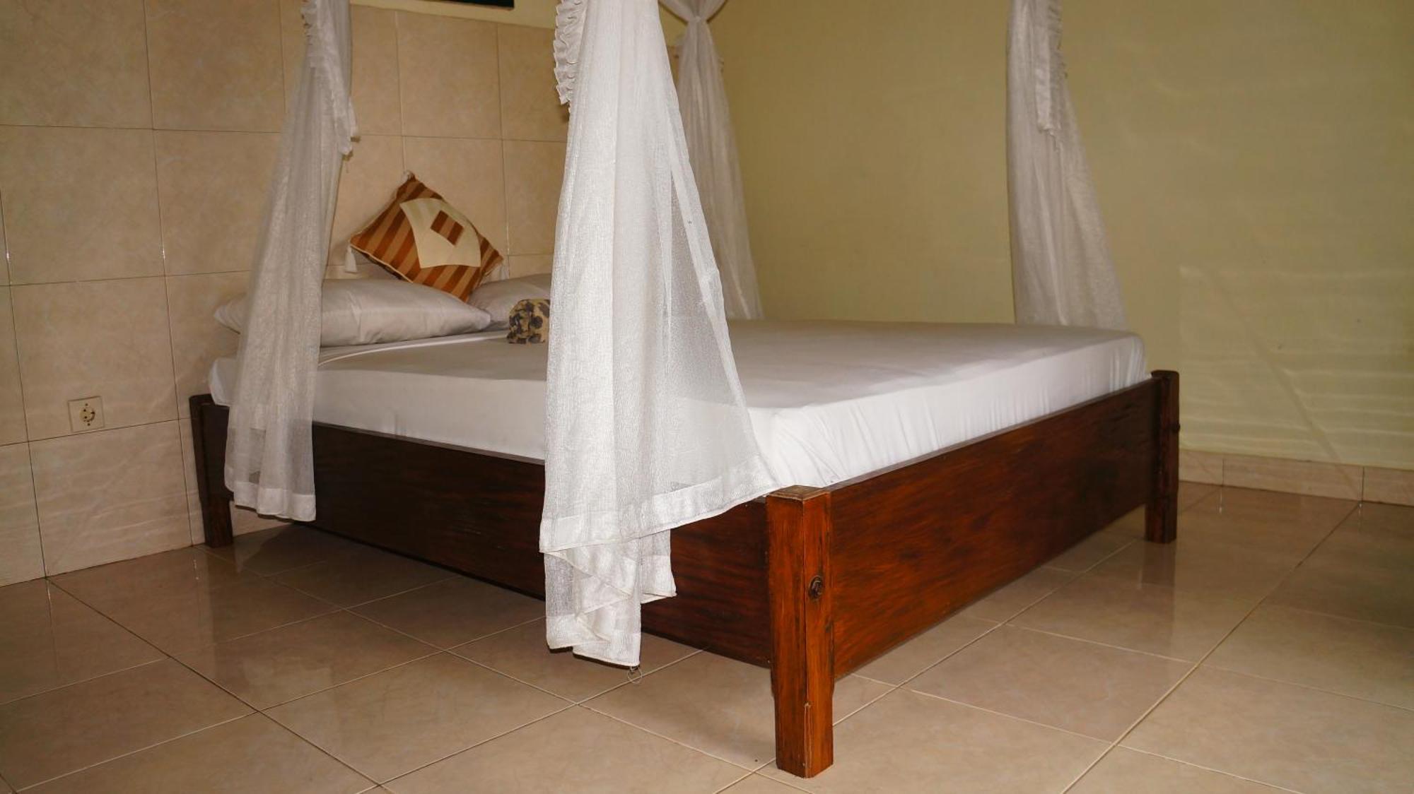 Rumahku Homestay Amed Esterno foto