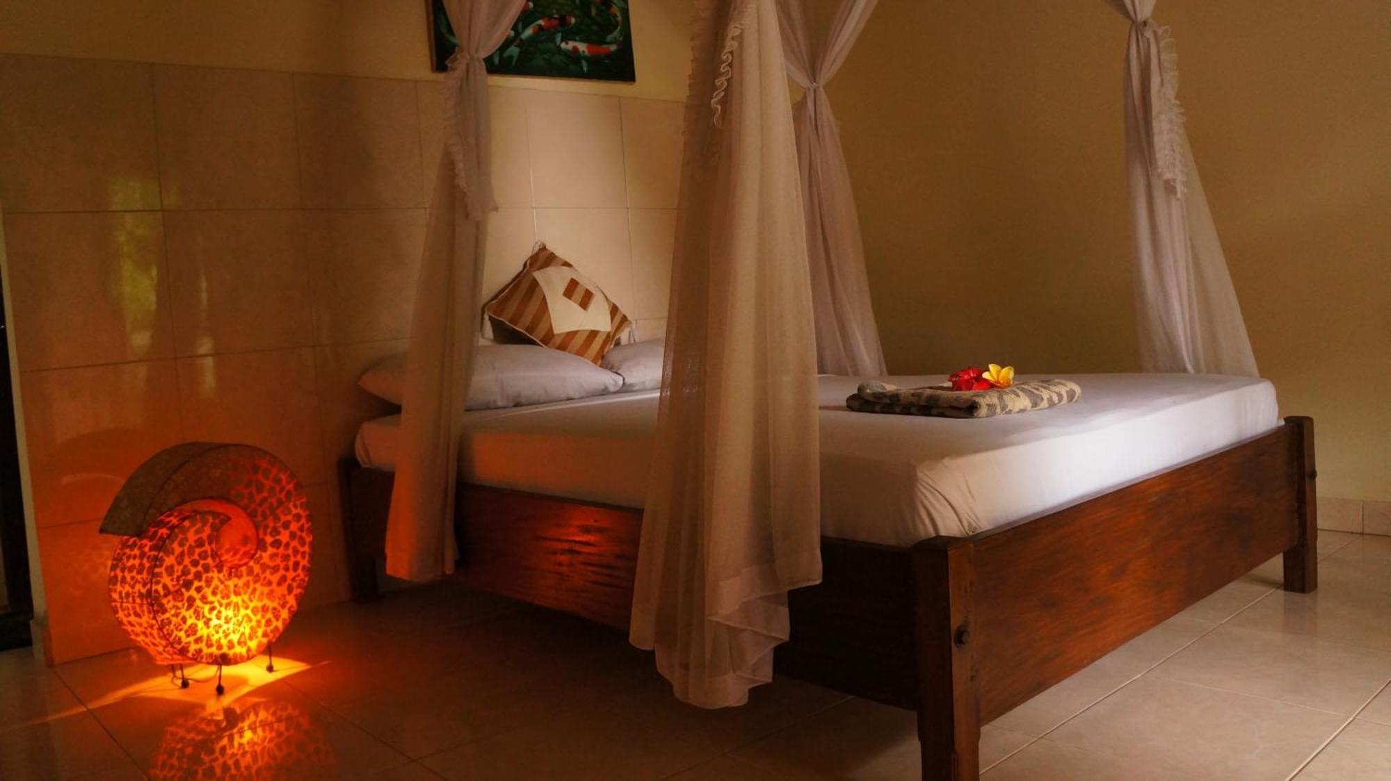 Rumahku Homestay Amed Esterno foto