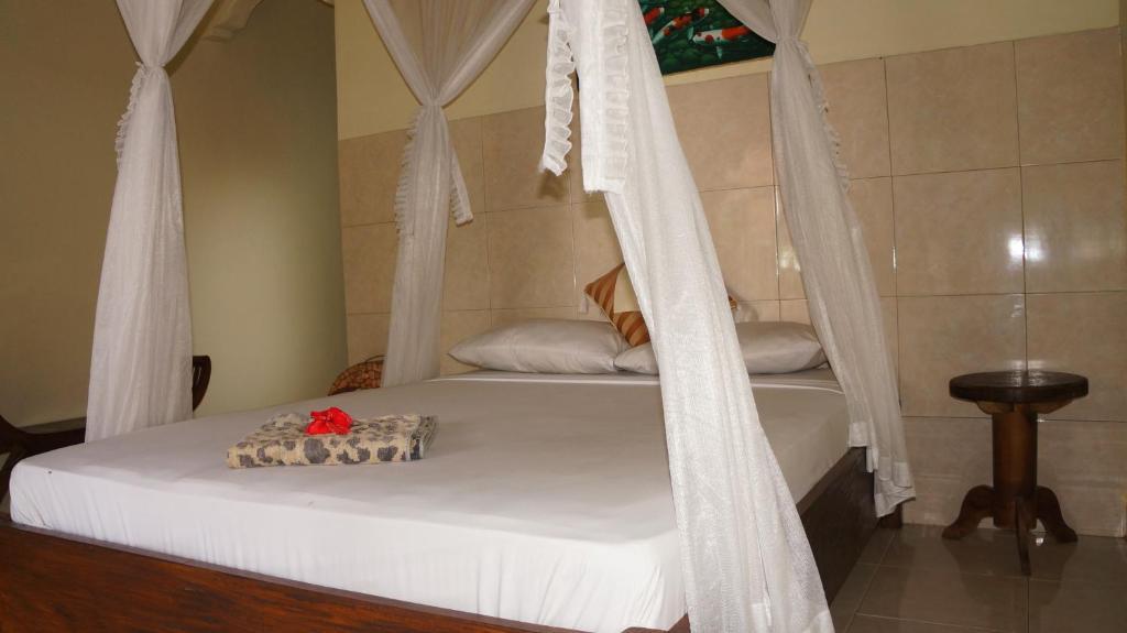 Rumahku Homestay Amed Esterno foto